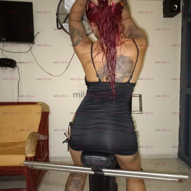 FOTOS DE HERMOSA PELI ROJA TATUADA DISPUESTA A COMPLACERTE