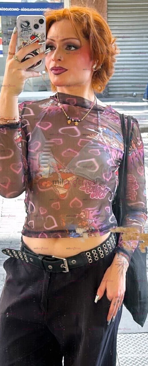 FOTOS DE UNA CHICA PELIRROJA CON MUCHA ENERGÍA VIVIENDO EN LA CIUDAD DE MÉXICO