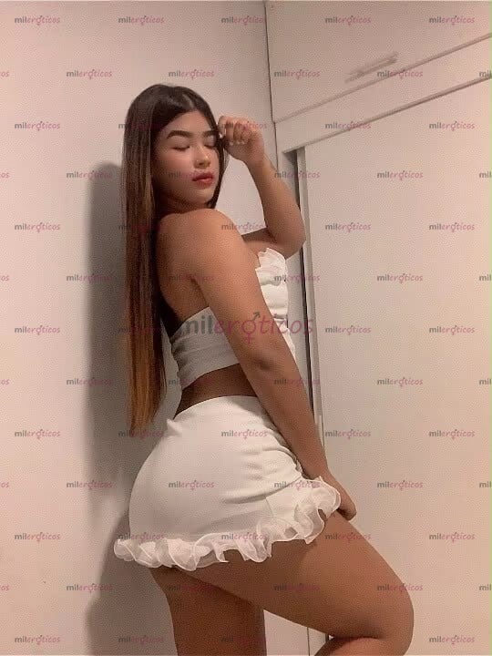 FOTOS DE HERMOSA CHINITA CON ROSTRO RADIANTE Y PERVERSA EN LA CIUDAD