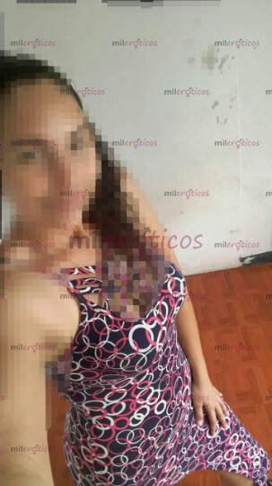 FOTOS DE MONA TROSUDITA, ALTA DE CABELLO RIZADO, OJOS VERDES BIEN HOT