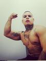 Soy axel macho acuerpado tatuado varonil disponible