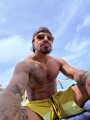 FOTOS DE ACTIVO TATUADO MORENO DISCRETO SOLO PARA HOMBRES